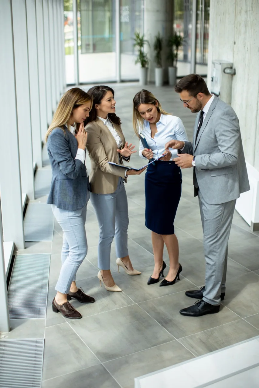 public relations professionals discussing communication strategy